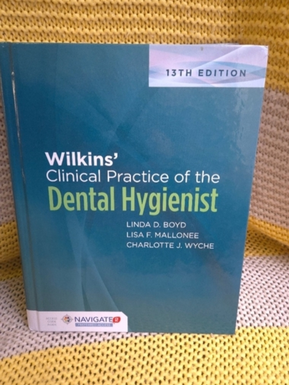 Textbook - 13th Edition Teal Cover with Yellow Background